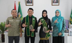 Kukuhkan_Muhammad_Ikram_Mullah_dan_Puan_Rizkya_Akila_sebagai_Duta_Wisata Wisata